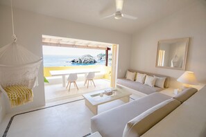 Appartement, 1 chambre, vue sur l’océan (CASITA PAPAYA) | Aire de séjour | Téléviseur à écran plat de 48 po avec télévision par satellite