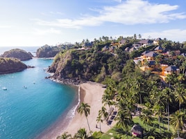 Private beach, beach umbrellas