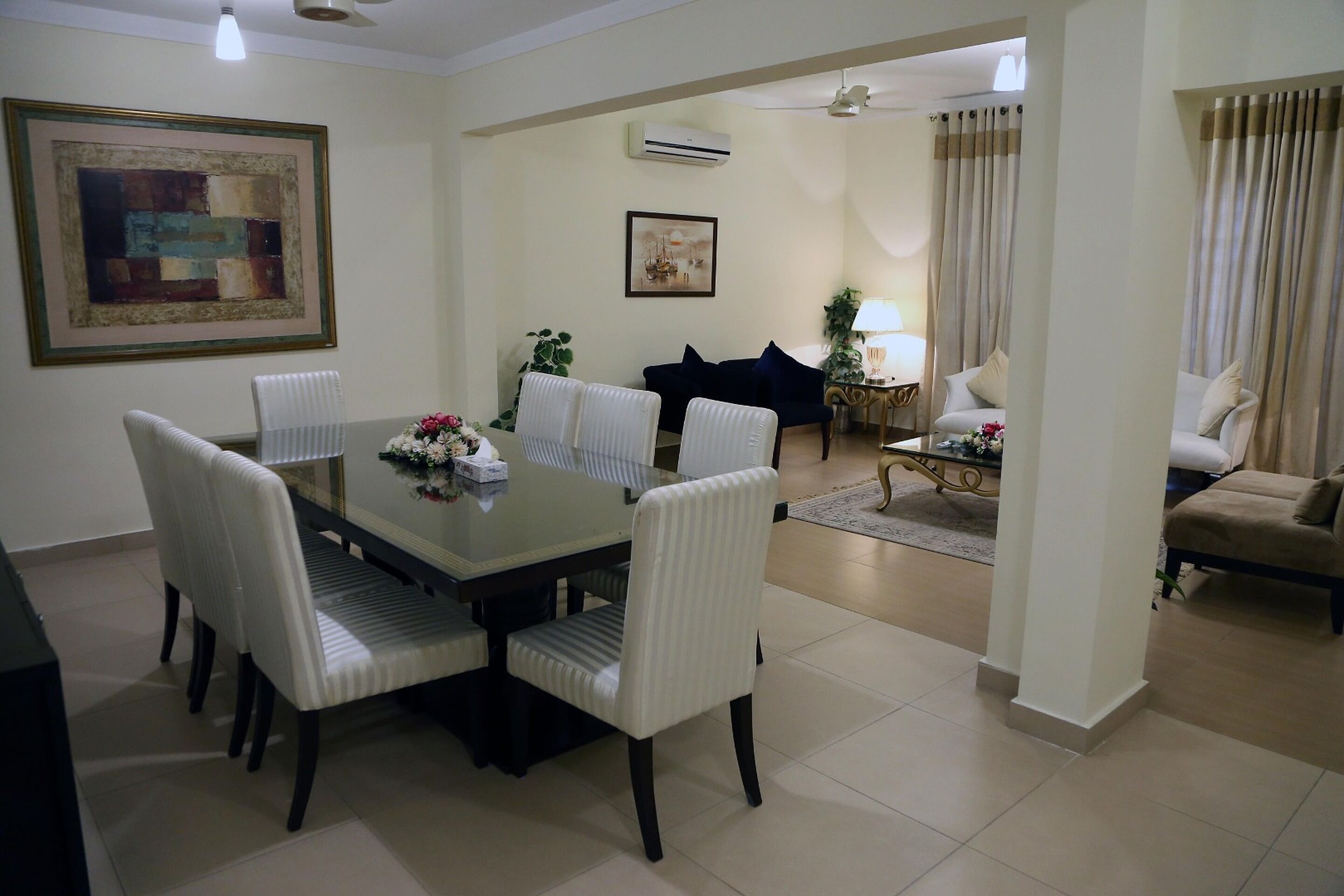 Executive Double Room | Living room | 42-inch flat-screen TV with cable channels, TV, DVD player