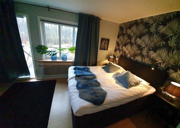 Apartemen Keluarga | 2 kamar tidur, tirai kedap cahaya, dan setrika/meja setrika