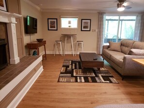 Smart TV, fireplace, table football, books