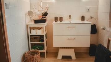 Hair dryer, towels, soap, toilet paper