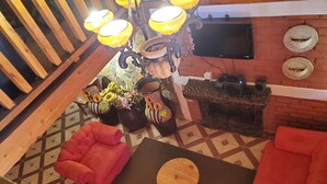 Deluxe Cabin, 2 Bedrooms, Mountain View | Living area | 32-inch flat-screen TV with satellite channels, TV - Cabaña Apaneca Ataco (Apaneca)