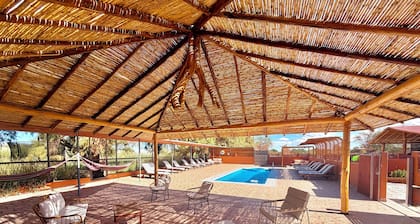 Peumayen Atacama / Hostal & Cabaña