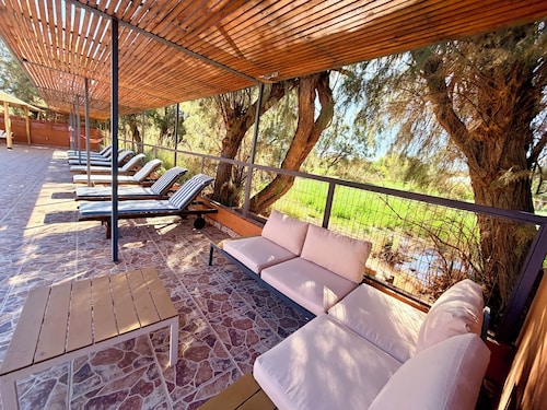 Peumayen Atacama / Hostal & Cabaña