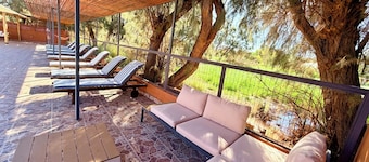 Peumayen Atacama / Hostal & Cabaña