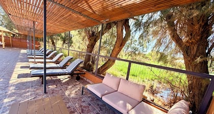 Peumayen Atacama / Hostal & Cabaña