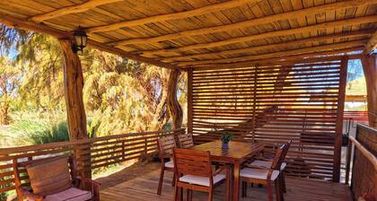 Peumayen Atacama / Hostal & Cabaña