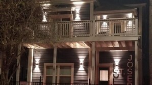 A two-story building with a balcony and a sign that reads "JOSEPH". -  SJ4 Exclusive  Private Historic Contemporary suites  (San Antonio)