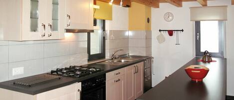 Fridge, oven, high chair, dining tables