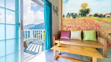 Rosemary Room | Living area | Flat-screen TV