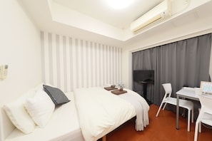 1 bedroom, desk, blackout curtains, iron/ironing board