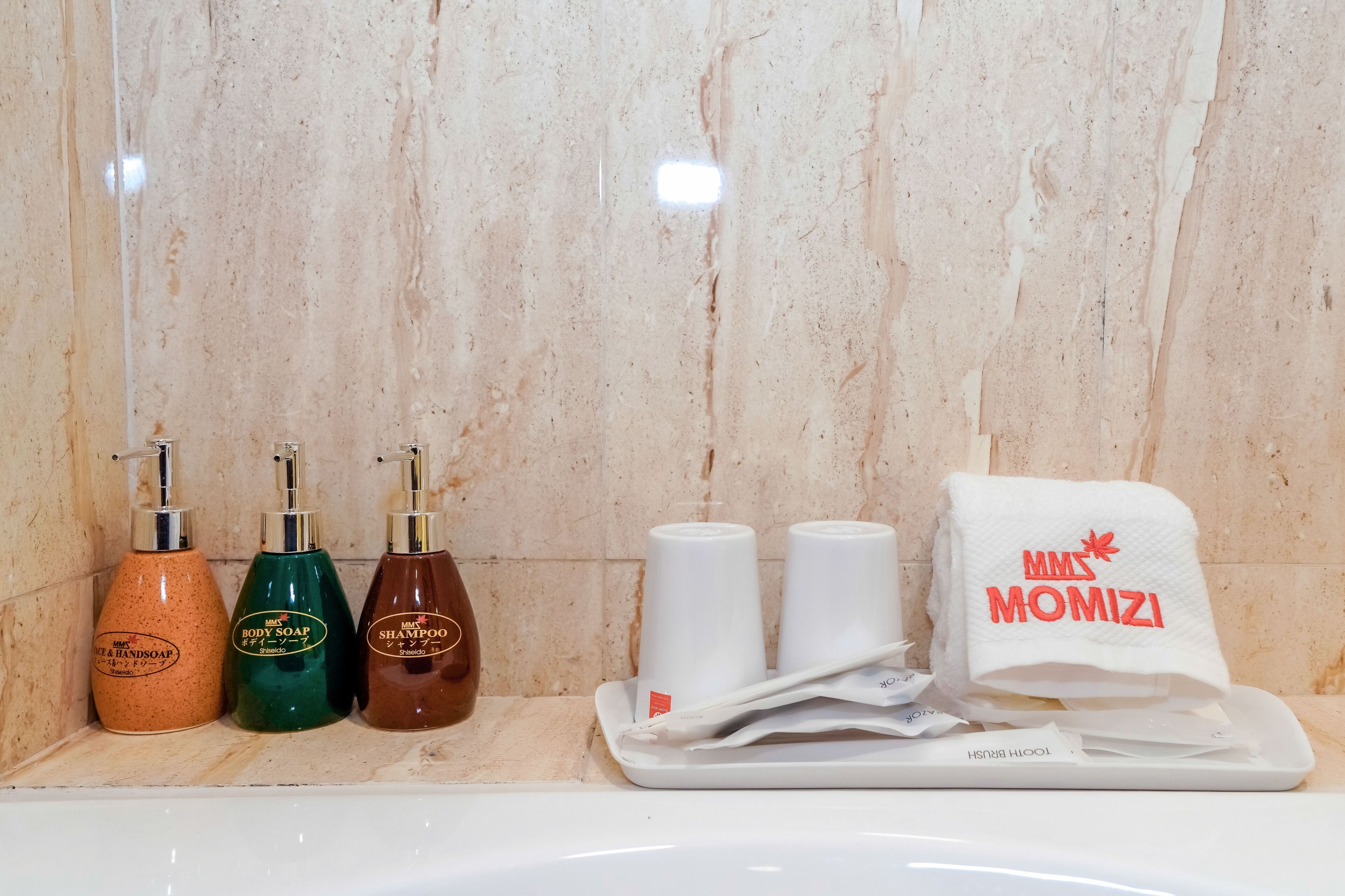 premium twin room | bathroom amenities | free toiletries, hair dryer, slippers, electronic bidet