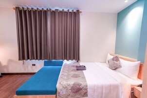 Luxury Double Room, 1 Queen Bed | Minibar, in-room safe, individually furnished, desk
