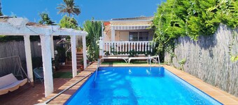 Semi-detached villa with large terrace with BBQ and private pool