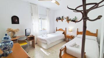 3 dormitorios, tabla de planchar con plancha, wifi gratis y ropa de cama