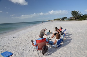 Guests can enjoy a serene beach experience with access to the ocean.