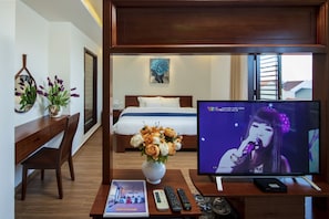 Luxury Triple Room | Minibar, desk, laptop workspace, blackout drapes - Sol's Villa Hoi An (Da Nang)