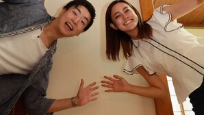 A room with a wooden headboard, a white wall, and a window with blinds. - IBASHO Roppongi (Tokyo)