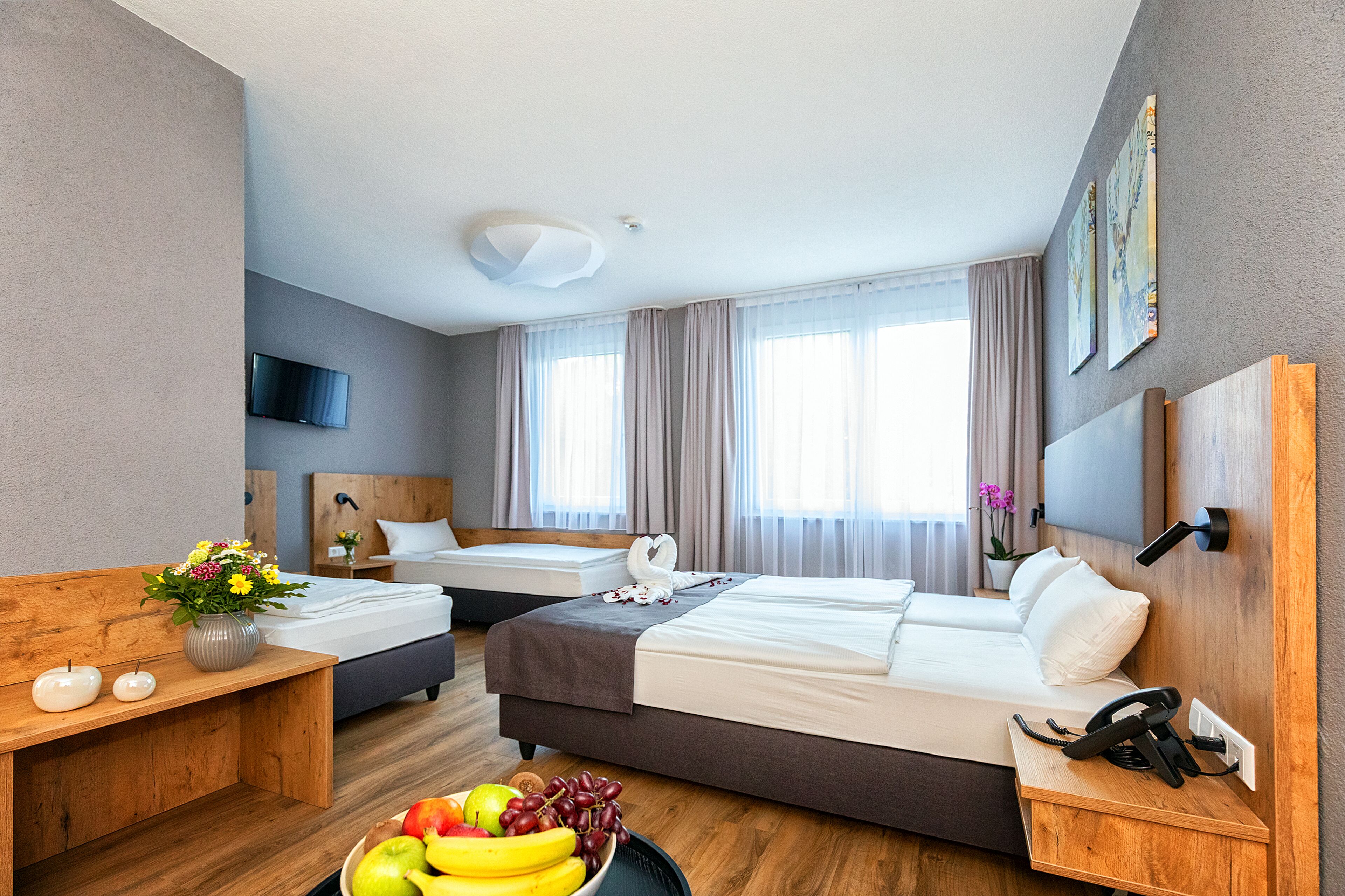 quadruple room | egyptian cotton sheets, premium bedding, in-room safe, blackout curtains