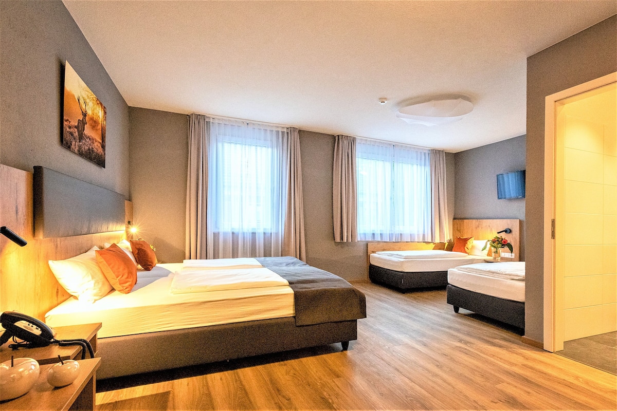 quadruple room | egyptian cotton sheets, premium bedding, in-room safe, blackout curtains