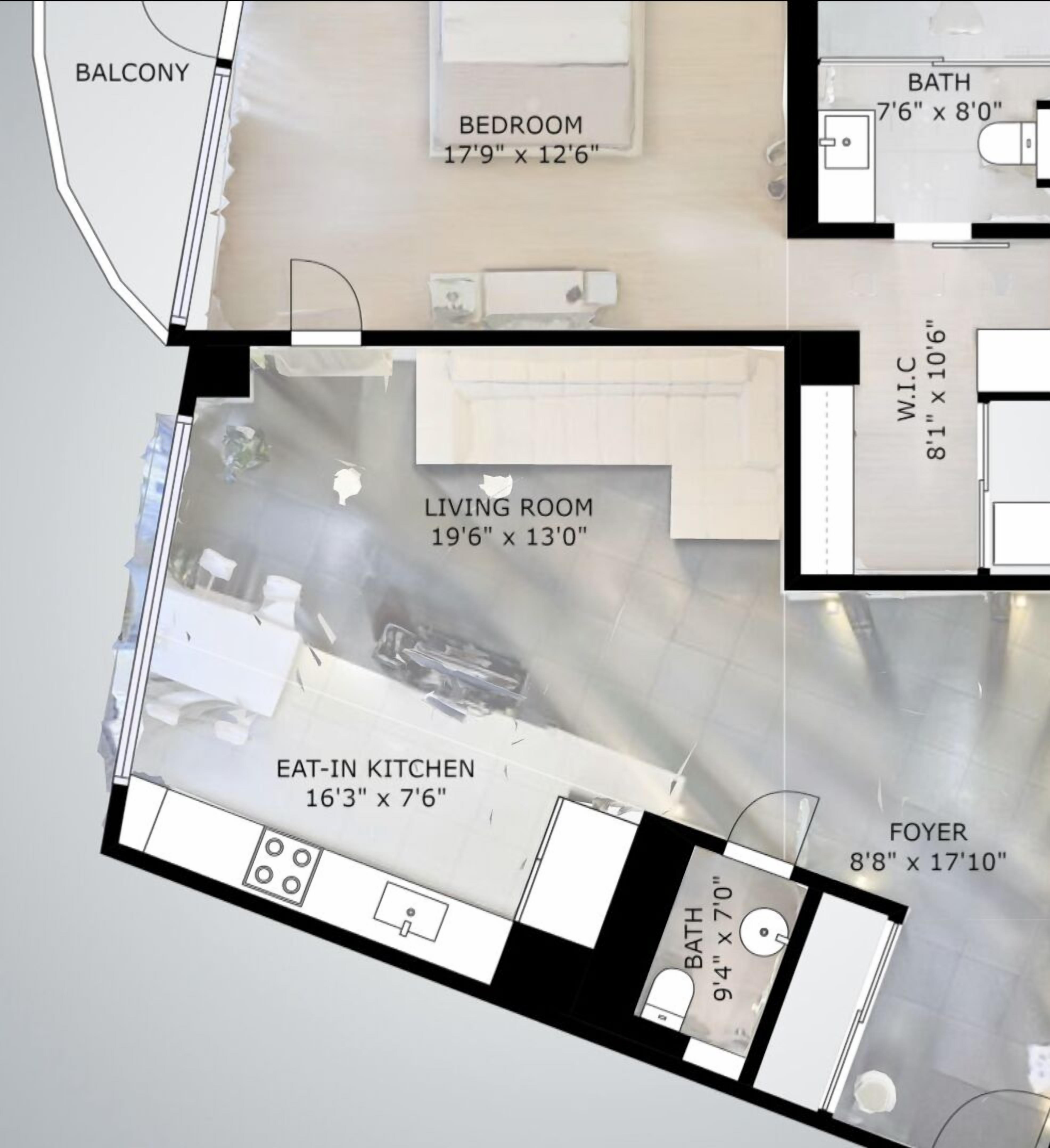 A floor plan of a house with a balcony, bedroom, living room, eat-in kitchen, foyer, and two bathrooms.