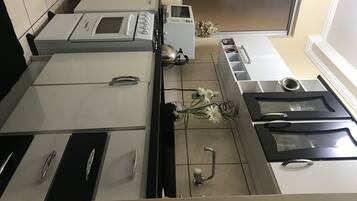 Fridge, microwave, toaster, cookware/dishes/utensils