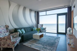 Apartment, 2 Bedrooms, Terrace | Living room | 40-inch flat-screen TV with cable channels, TV - Apartament Nadmorski Luksus - Boulevard (Ustronie Morskie)