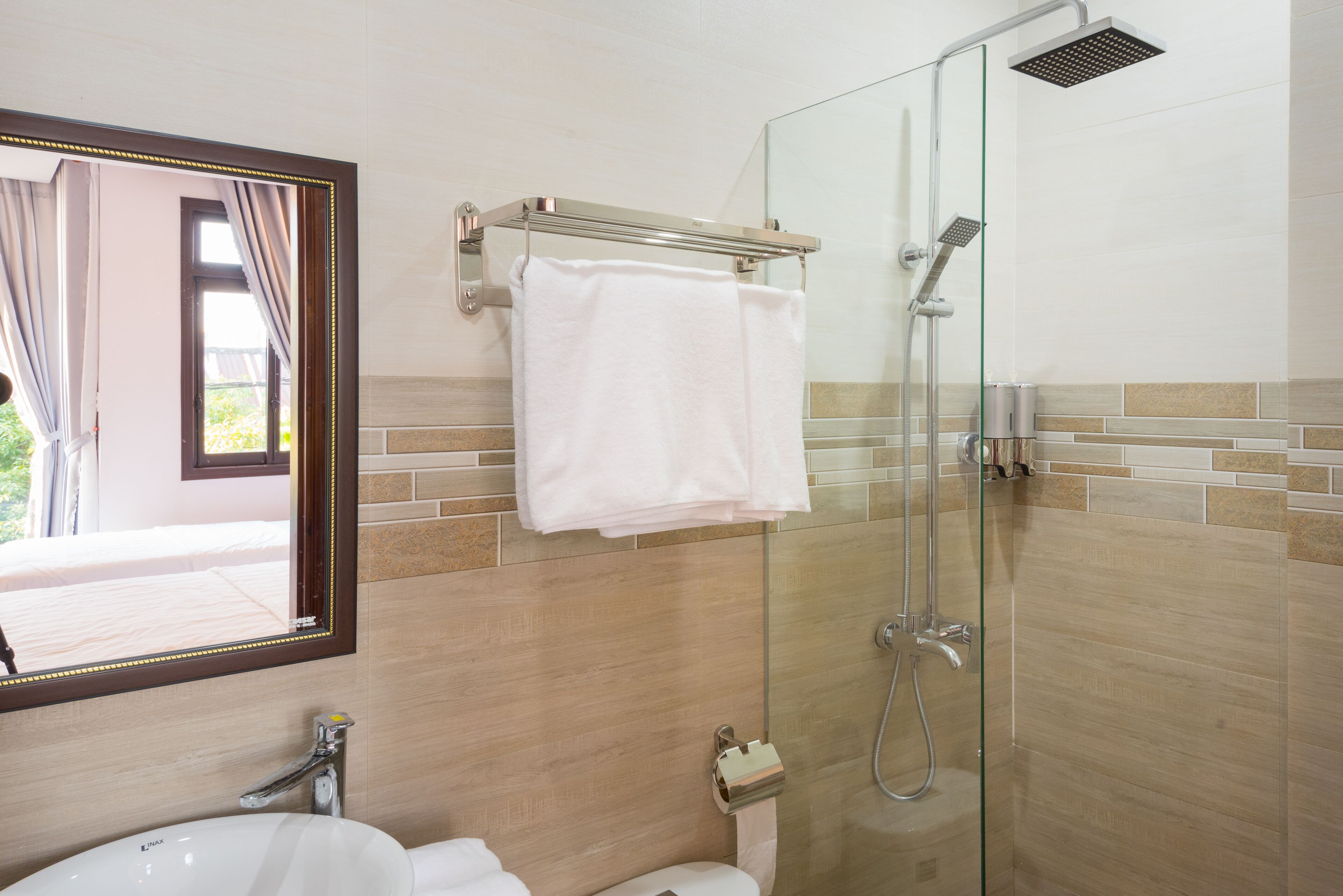 Shower, hair dryer, slippers, towels