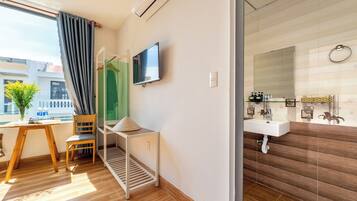 Family Room, City View | Minibar, desk, iron/ironing board, free WiFi