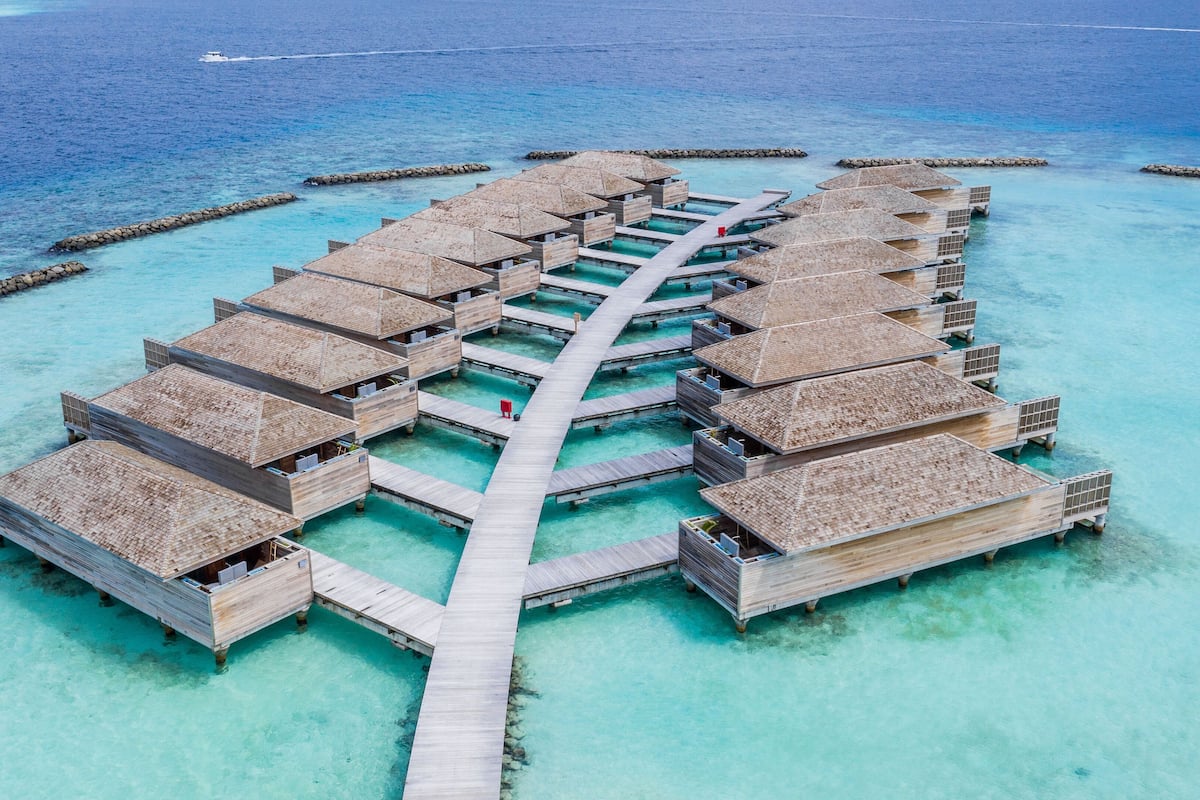An overwater bungalows structure with a central walkway.