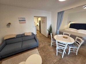 Apartment | Living area | 82-cm LCD TV with satellite channels, TV - Apartments Ante (Dubrovnik)