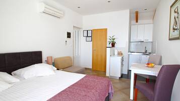 Blackout curtains, iron/ironing board, free WiFi, bed sheets