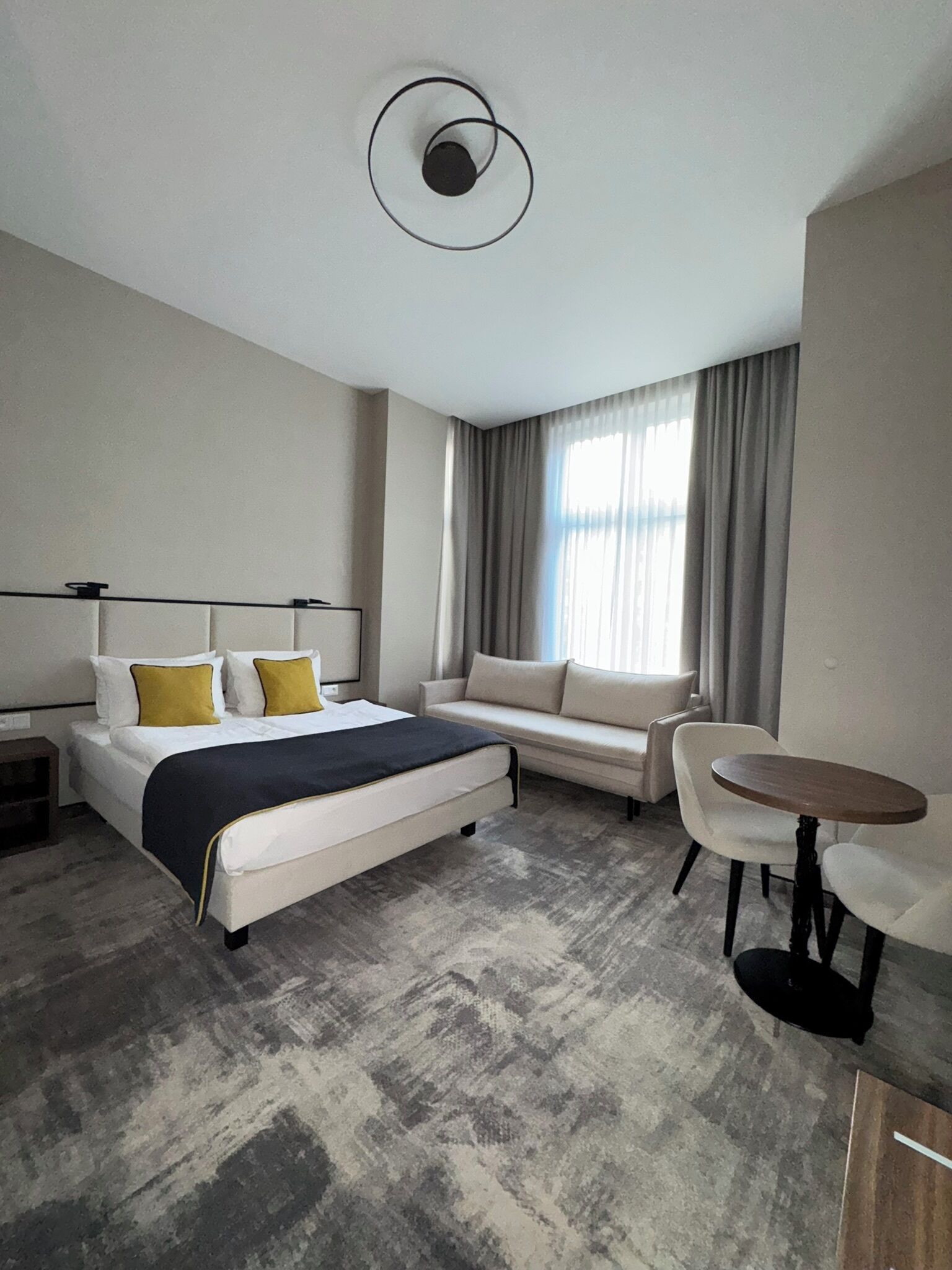 Premium Quadruple Room | In-room safe, desk, blackout drapes, iron/ironing board