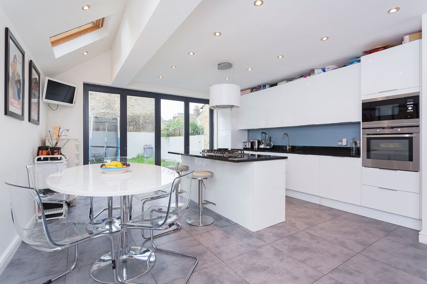 Fridge, oven, dishwasher, dining tables