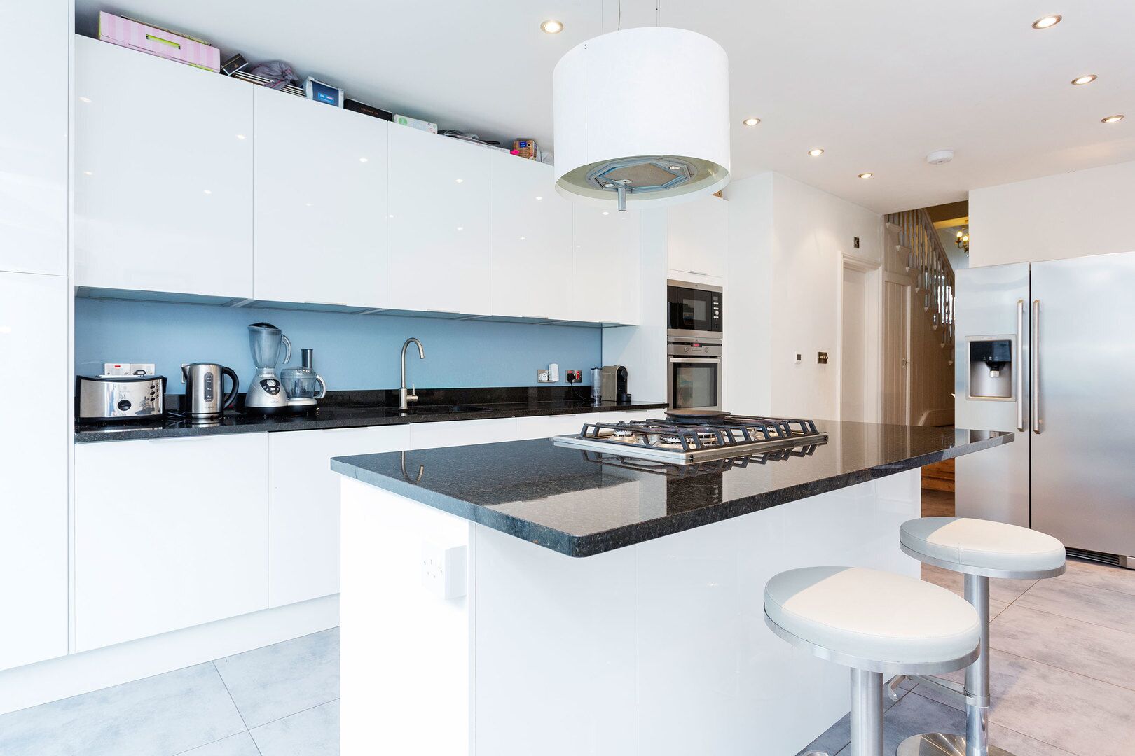 Fridge, oven, dishwasher, dining tables