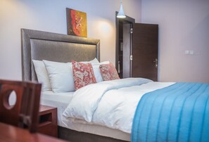 Suite – executive | Skrivebord, wi-fi (inkludert) og sengetøy