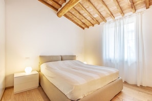 Apartamento, 2 habitaciones | 2 dormitorios, cunas (de pago), wifi gratis y ropa de cama