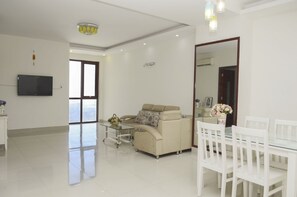 Standard Apartment, 2 Bedrooms (21H) | Living area | 21-inch flat-screen TV with cable channels, TV - Thuy Hanh Homestay Vung Tau (Ho Chi Minh City)