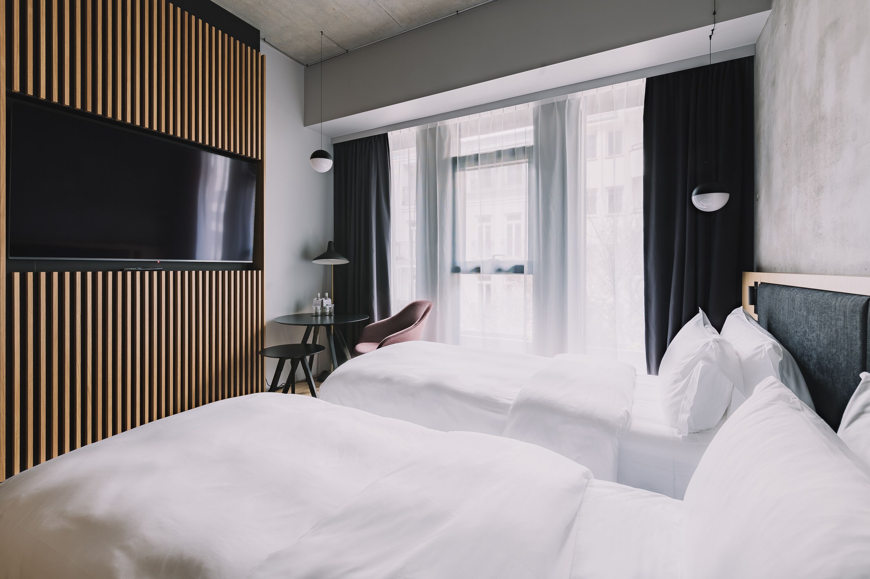 hypo-allergenic bedding, down duvets, pillow-top beds, minibar