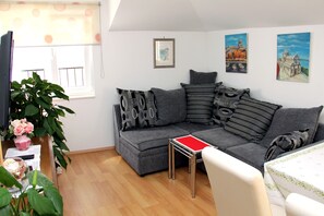 Departamento urbano | Sala de estar | Televisión de pantalla plana 