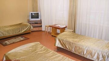 Standard Triple Room | Minibar, iron/ironing board (on request), free WiFi, bed sheets