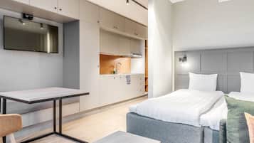 Blackout drapes, soundproofing, iron/ironing board, free wired internet