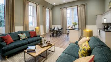 Luxury Apartment (The Maitland) | Living room | 28-inch Smart TV with digital channels, TV, Netflix