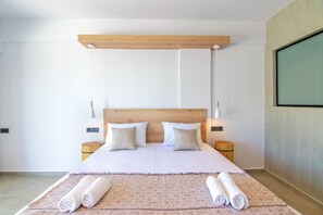 2 chambres, coffres-forts dans les chambres, fer et planche à repasser