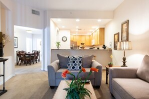 Family Apartment, Garden Area | Living room | Flat-screen TV, video-game console
