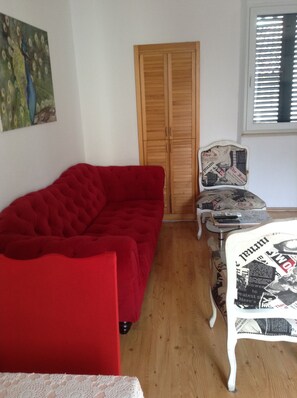 Apartment, 2 Bedrooms | Living area | Flat-screen TV