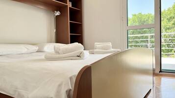 Panoramic Apartment, 2 Bedrooms, Garden View | 2 bedrooms, individually decorated, individually furnished, free WiFi