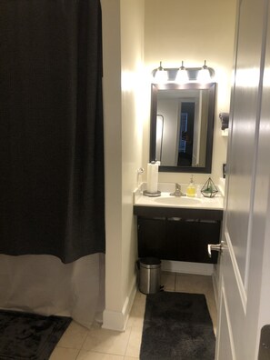 Shower, towels, soap, toilet paper