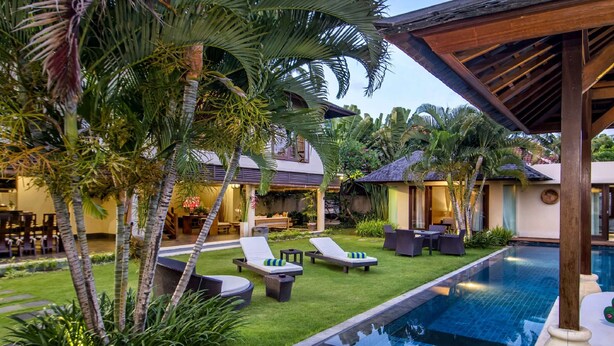 A poolside area with lounge chairs, a small pool, and tropical plants. - Beautiful Villa With Private Pool, Bali Villa 2017 (Seminyak)